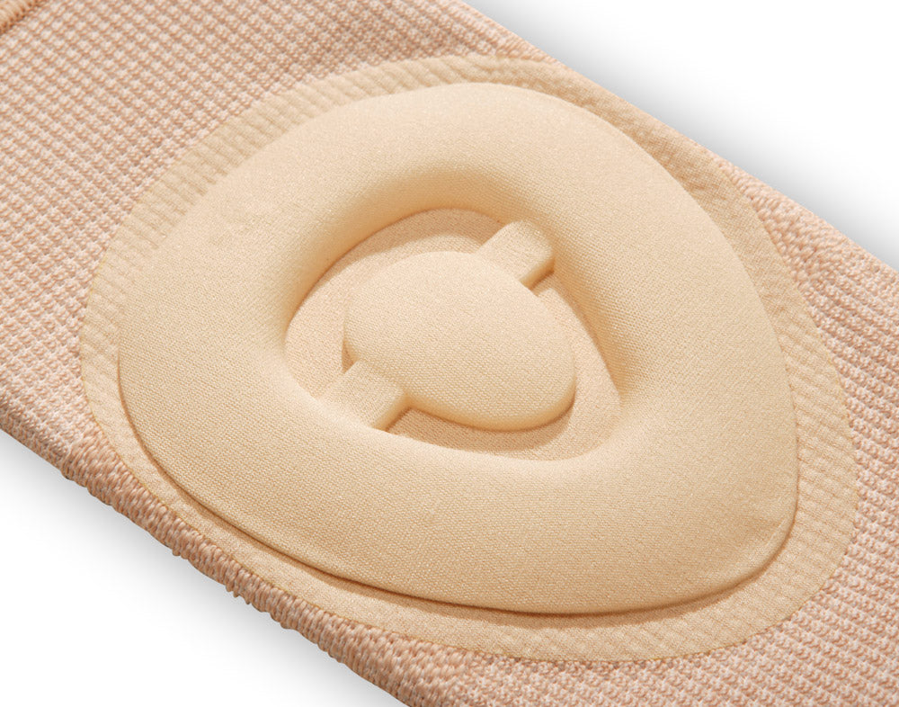 Beige fabric with a circular cutout and central button on a white background