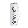 Stitch Kit packaging with a needle and thread on a white background
