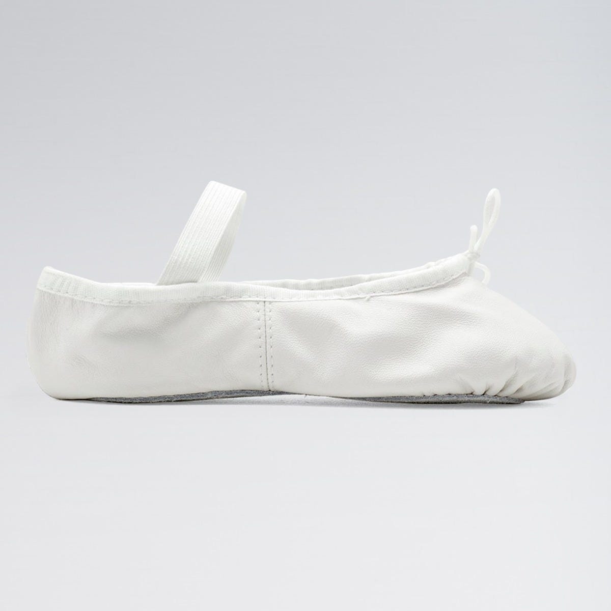 White ballet shoe on a gray background