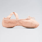 Pink ballet shoe on a light gray background