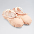 Pair of pink ballet shoes on a light gray background
