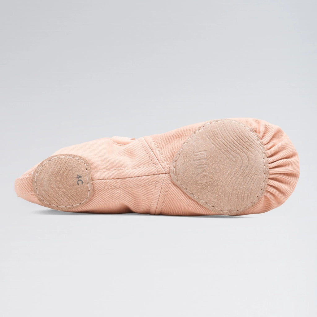 Pink ballet shoe with a gray background