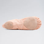 Pink ballet shoe with a gray background