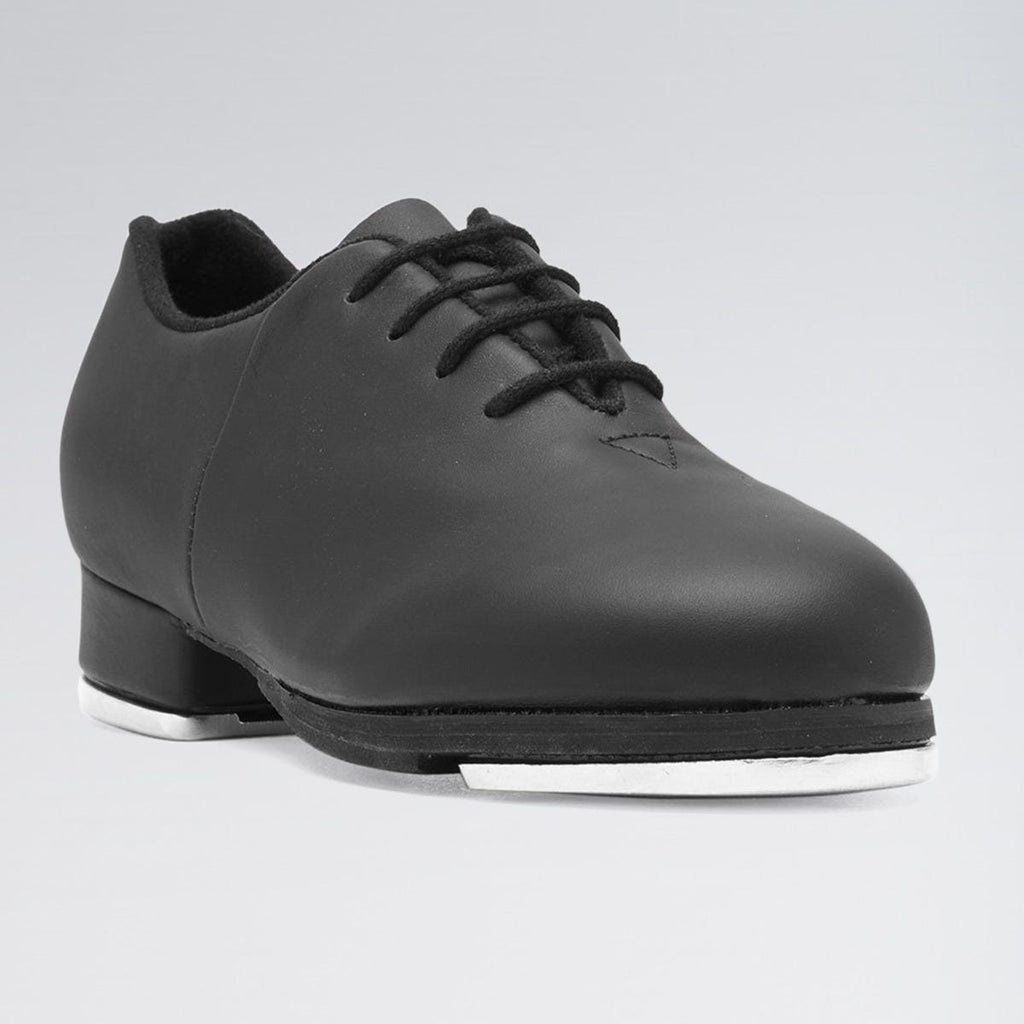 Black tap shoe on a gray background