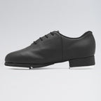 Black tap shoe on a light gray background