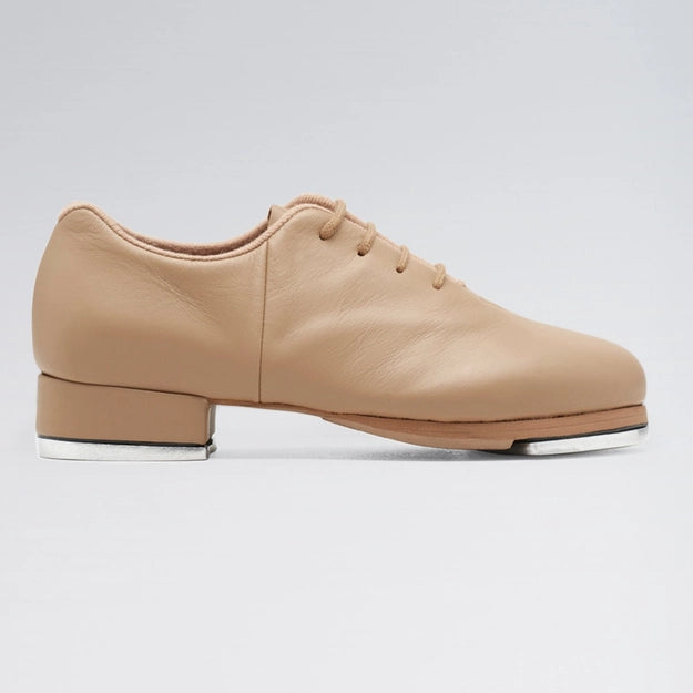 Tan tap shoe on a light gray background