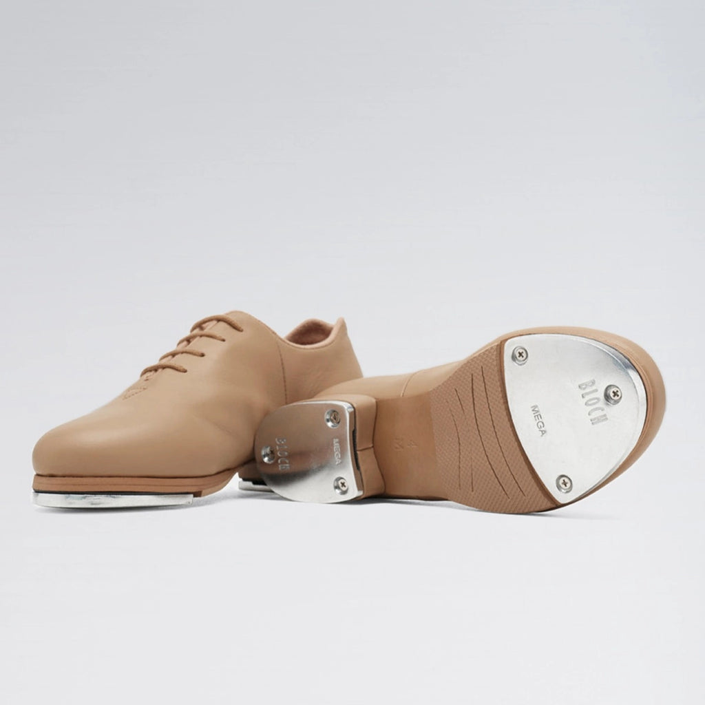 Tan tap shoes with metal toes on a white background