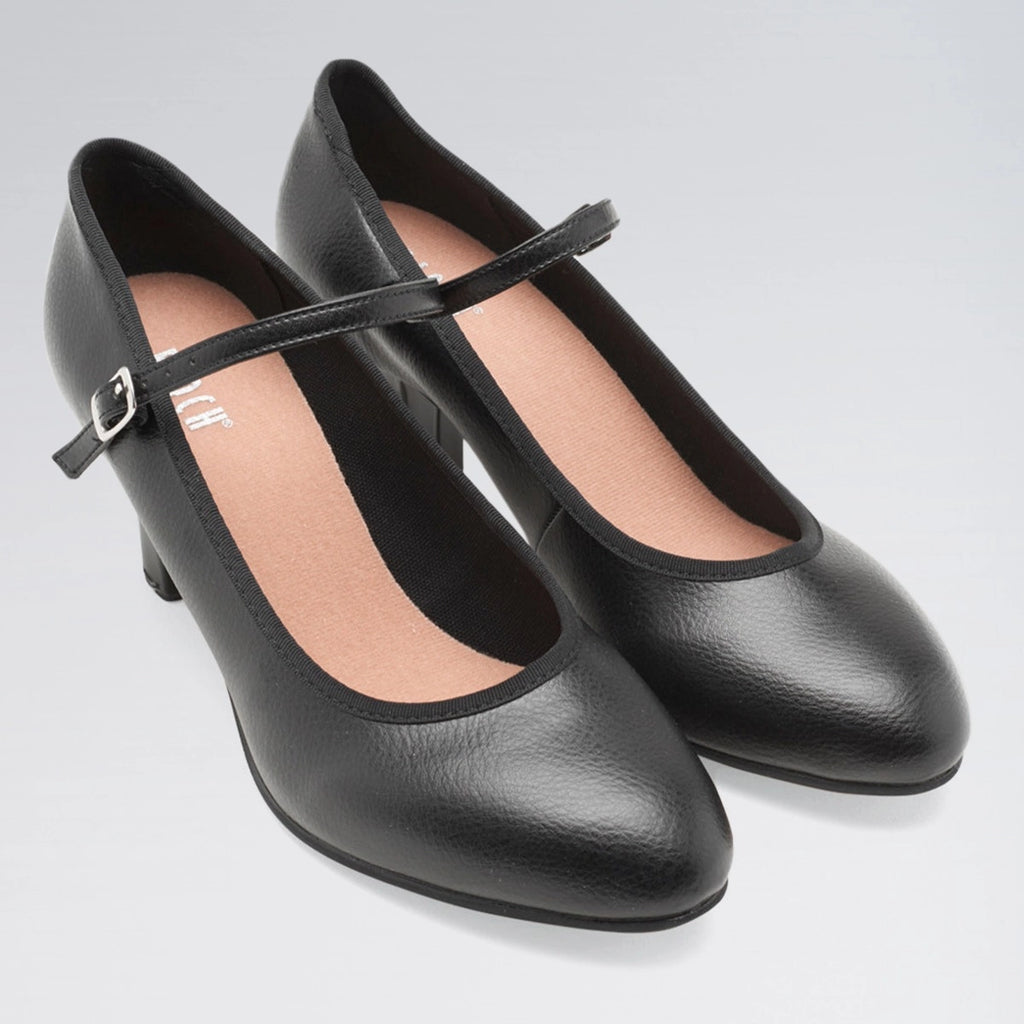 Black high-heeled shoes with a strap on a light gray background