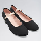 Black shoes with a strap on a light gray background