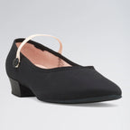 Black shoe with a small heel on a light gray background