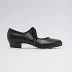 Black shoe with a low heel on a light gray background