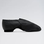 Black dance shoe on a light gray background