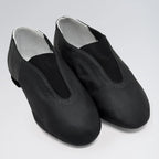 Pair of black dance shoes with silver lining on a light gray background