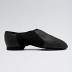 Black dance shoe on a light gray background