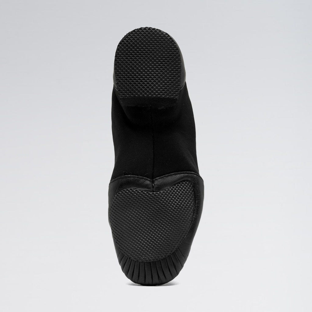 Black sock boot on a light gray background