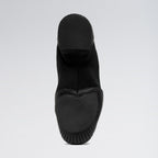 Black sock boot on a light gray background