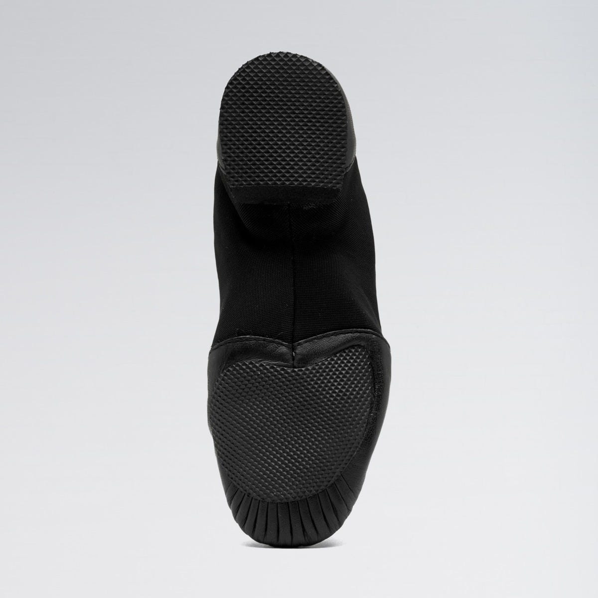 Black sock boot on a light gray background