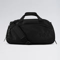 Black duffel bag with 'Block' branding on a light gray background