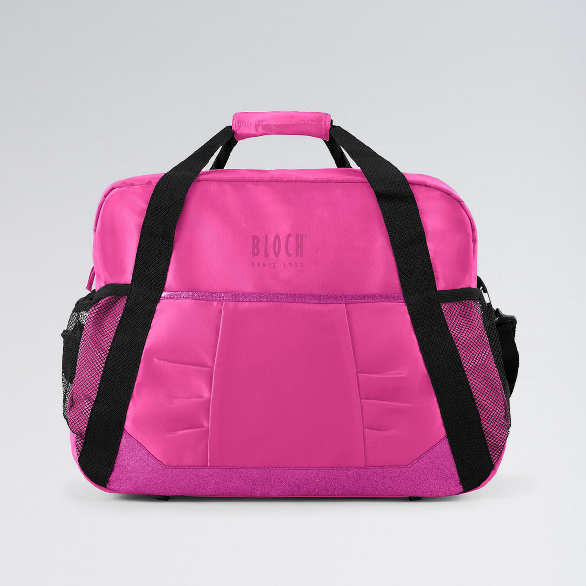 Pink bag with black straps on a light gray background