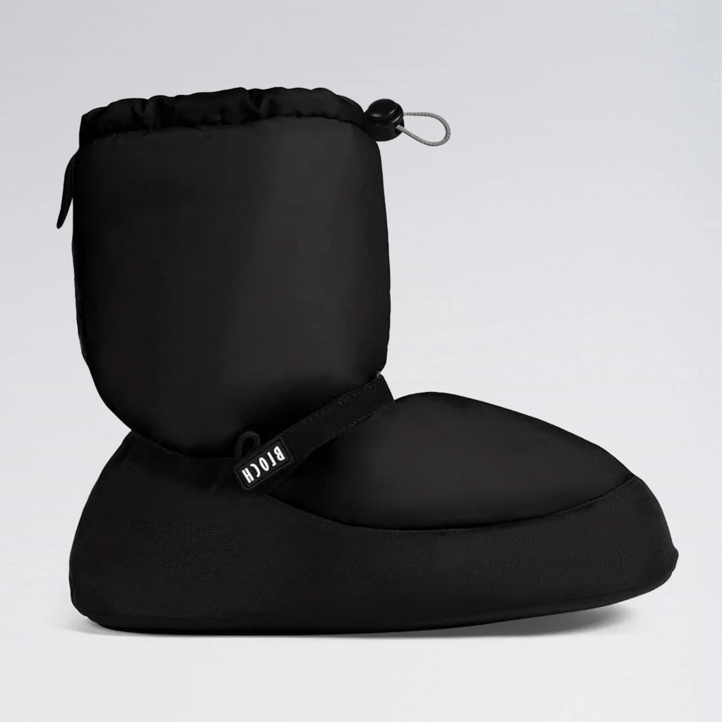 Black travel pillow with drawstring on a light gray background