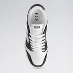 White and black sneaker with 'BLOCH' branding on a light gray background