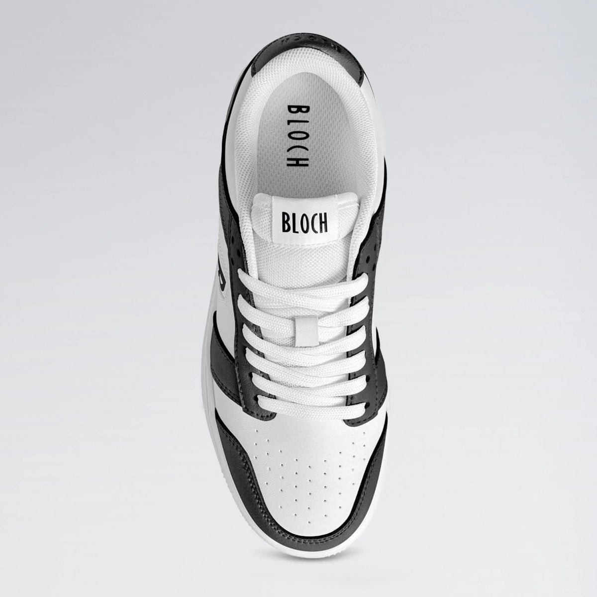 White and black sneaker with 'BLOCH' branding on a light gray background