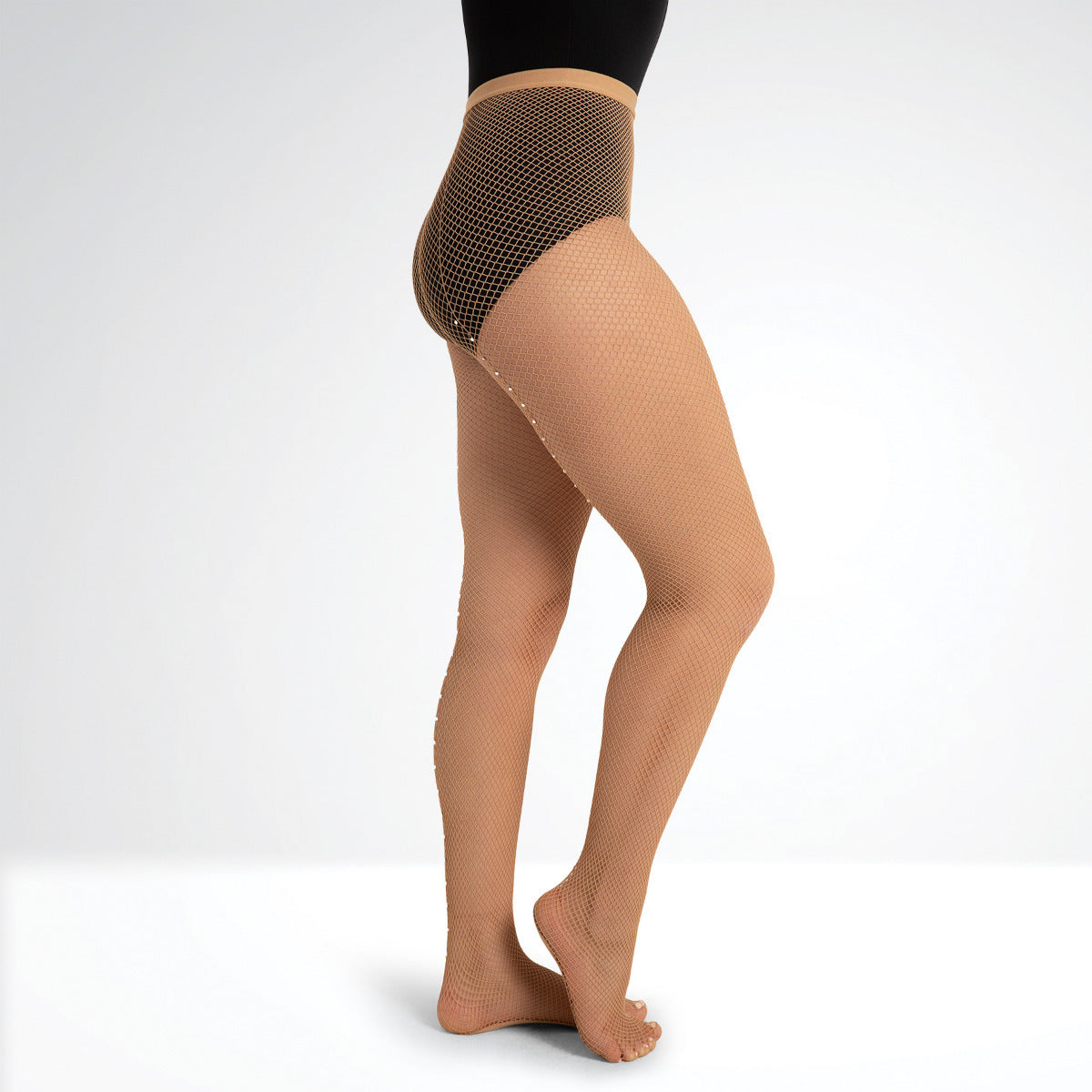 Beige fishnet stockings worn by a person on a white background