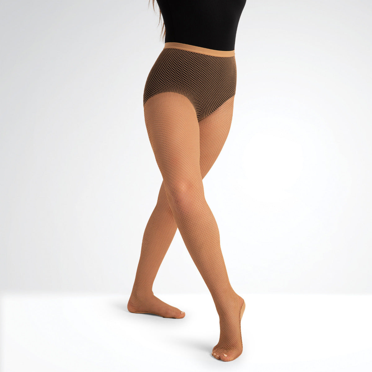 Person wearing brown fishnet tights on a white background
