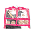 Clear travel organizer with pink frame displaying various items including socks and underwear.