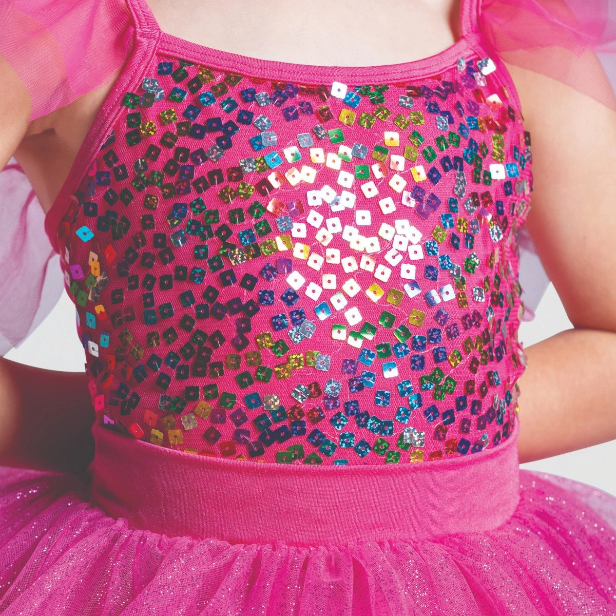 1st Position pink sequin tutu costume with flutter sleeves, glitter tutu skirt and ribbon trim for ballet performances, competitions and themed dance shows