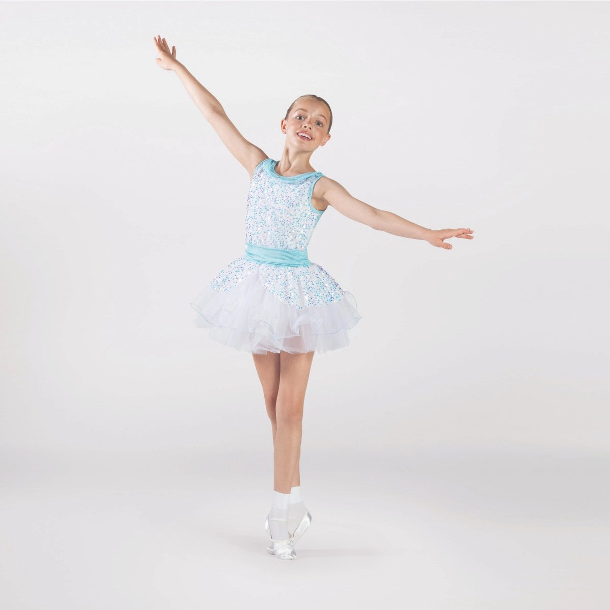 1st Position sequin ballet tutu dress in white and aqua with layered tutu skirt, peplum detail and sequin bodice for ballet performances and competitions