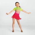 Young girl in a colorful dance outfit with a gradient top and pink skirt on a white background