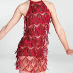 Red beaded dress on a plain background