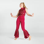 Dancer in a red outfit with sequined top on a white background