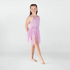 Young girl wearing a pink dress on a white background
