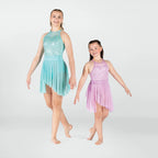 Two young girls wearing dance dresses on a white background