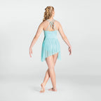 Person wearing a light blue舞蹈 dress with criss-cross straps on a white background