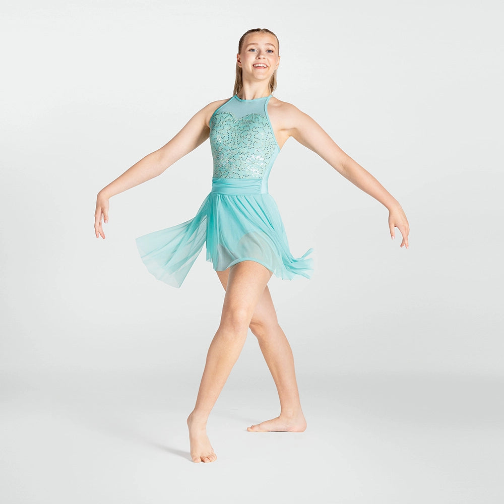 Girl in a turquoise dance dress posing on a white background
