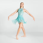 Girl in a turquoise dance dress posing on a white background