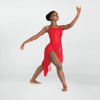 Dancer in a red dress posing against a white background