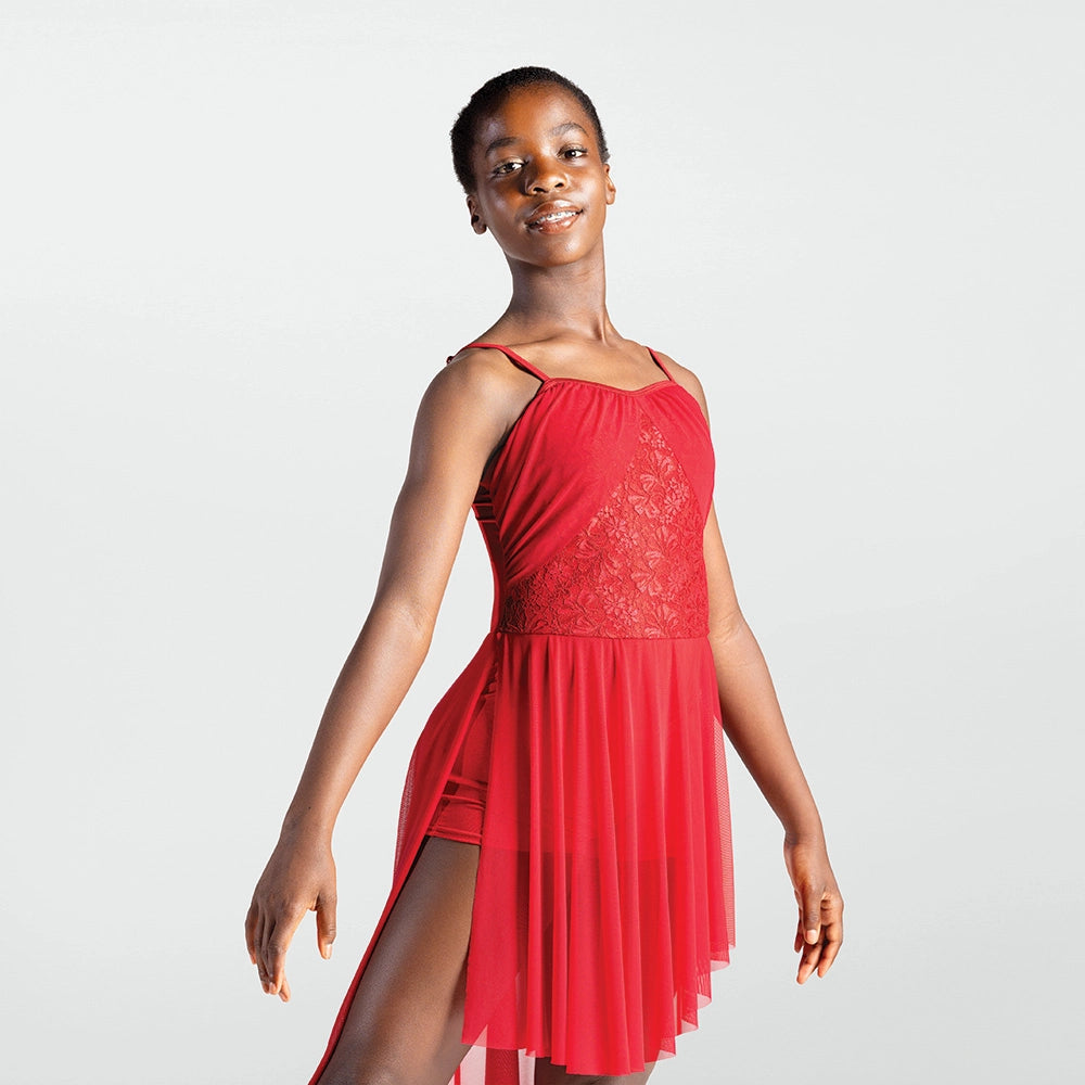 Woman wearing a red dress with a white background