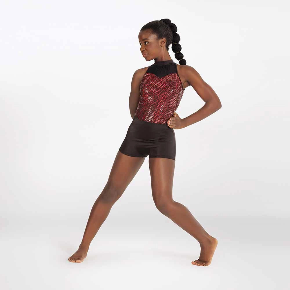 Dancer in a black and red leotard on a white background