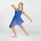 Woman in a blue dress posing on a white background