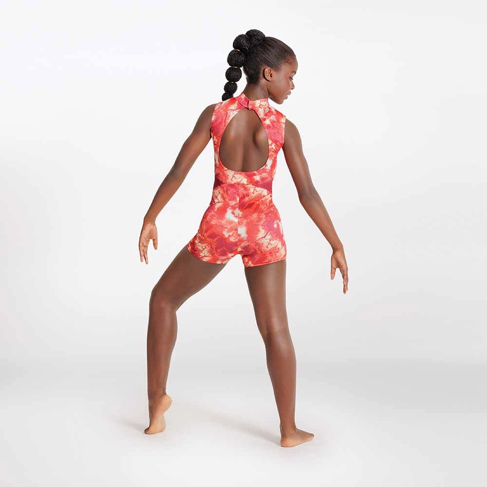 Person wearing a red floral leotard on a white background