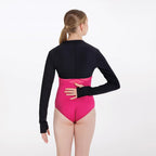 Person wearing a black and pink bodysuit on a white background