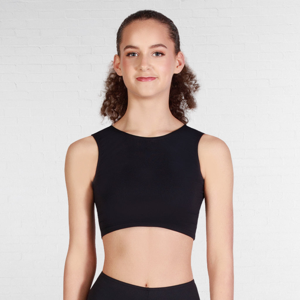 Person wearing a black sleeveless top against a plain background