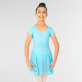 Young girl wearing a light blue dress against a white background