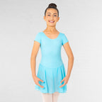 Young girl wearing a light blue dress against a white background