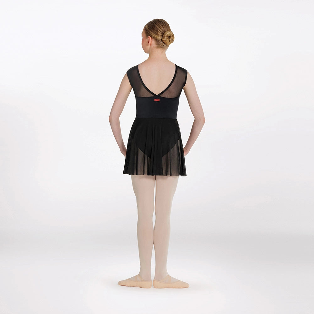 Person wearing a black ballet dress on a white background