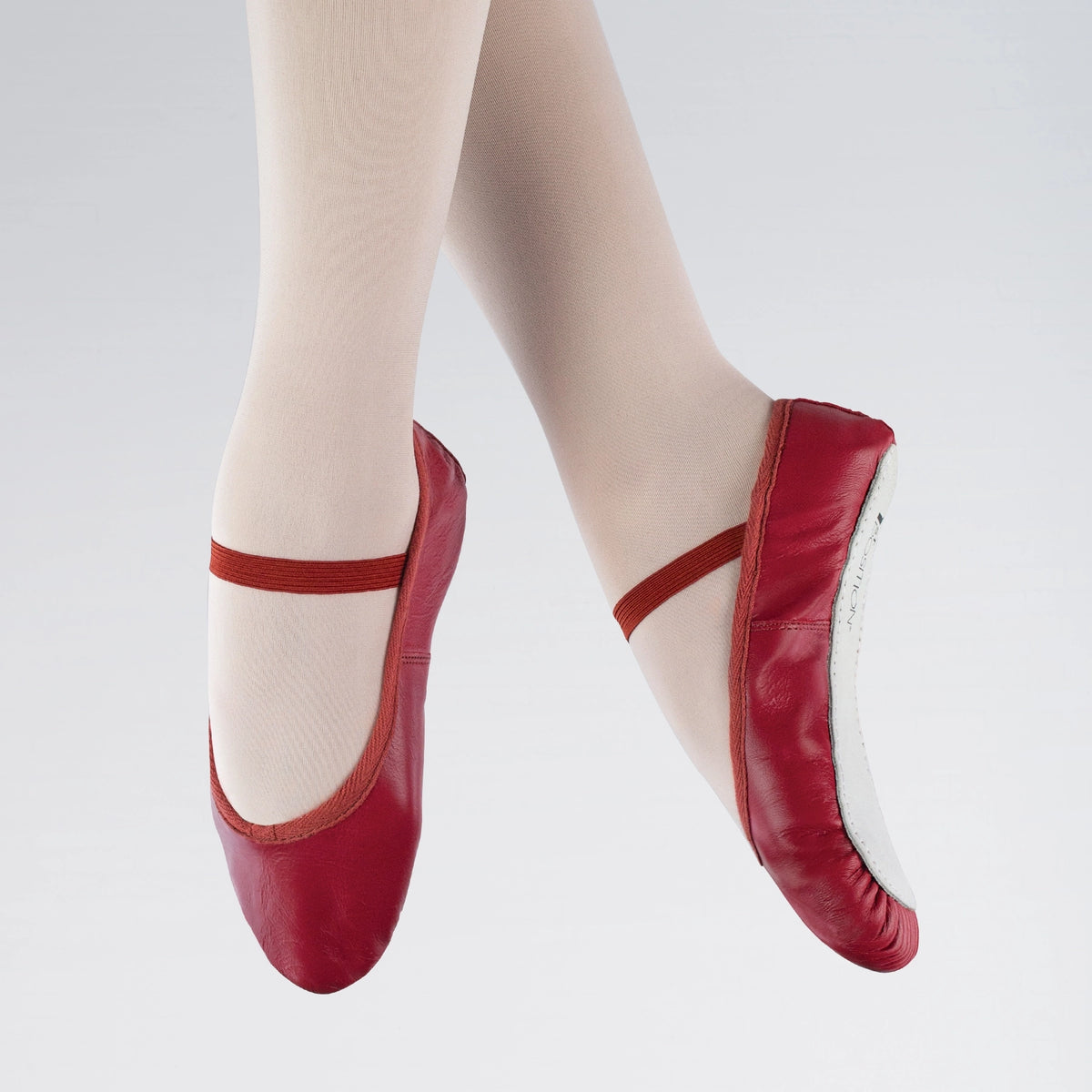 1st Position red leather full sole ballet shoes with pre-sewn elastic and drawstring fit for ballet classes, exams and performances
